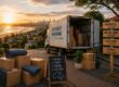 Interstate moving truck leaving Sydney Eastern Suburbs at sunset with packed boxes and highway signs